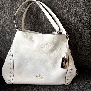 Coach Edie White with Dustbag